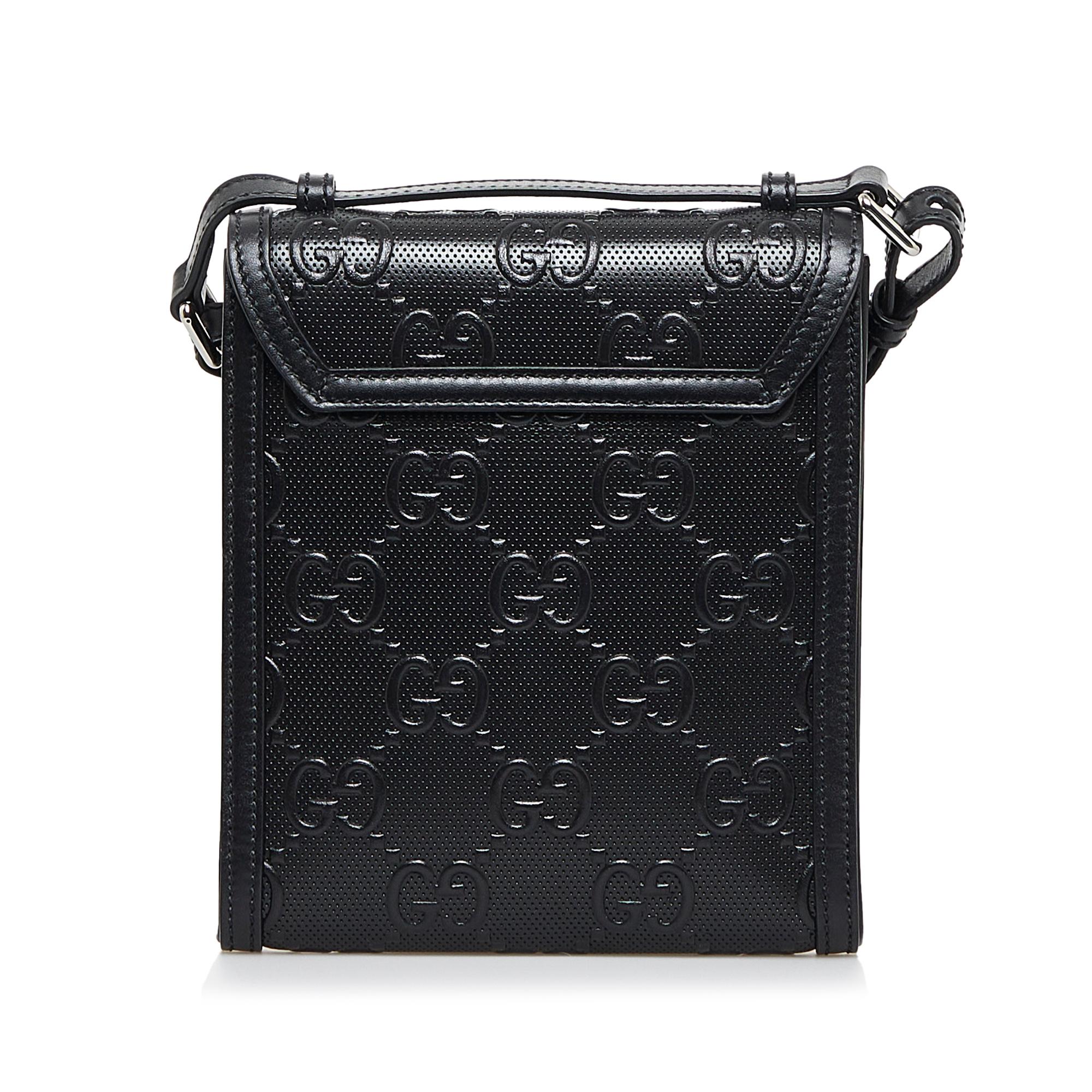 gg-embossed-perforated-messenger-bag