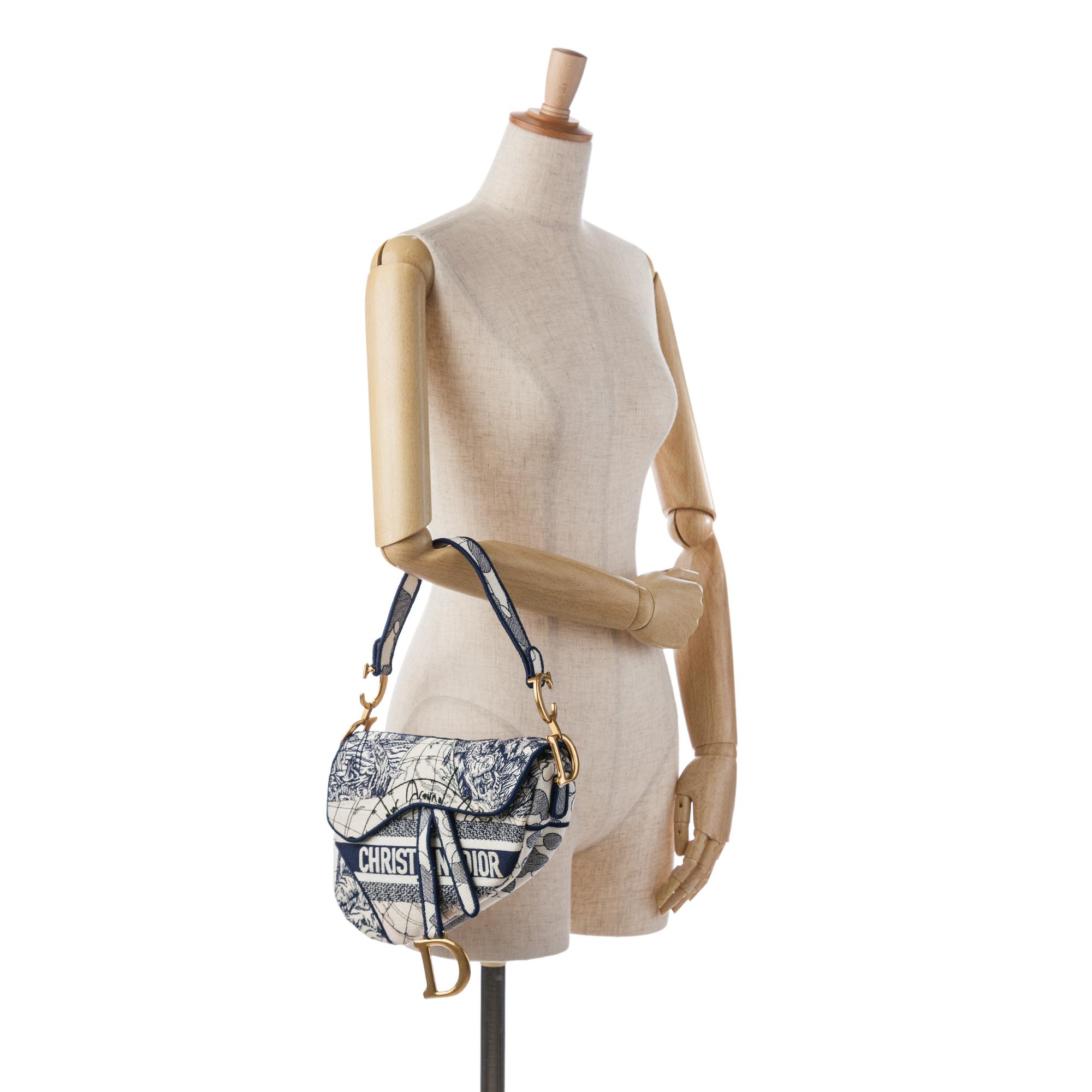 embroidered-canvas-around-the-world-saddle-bag