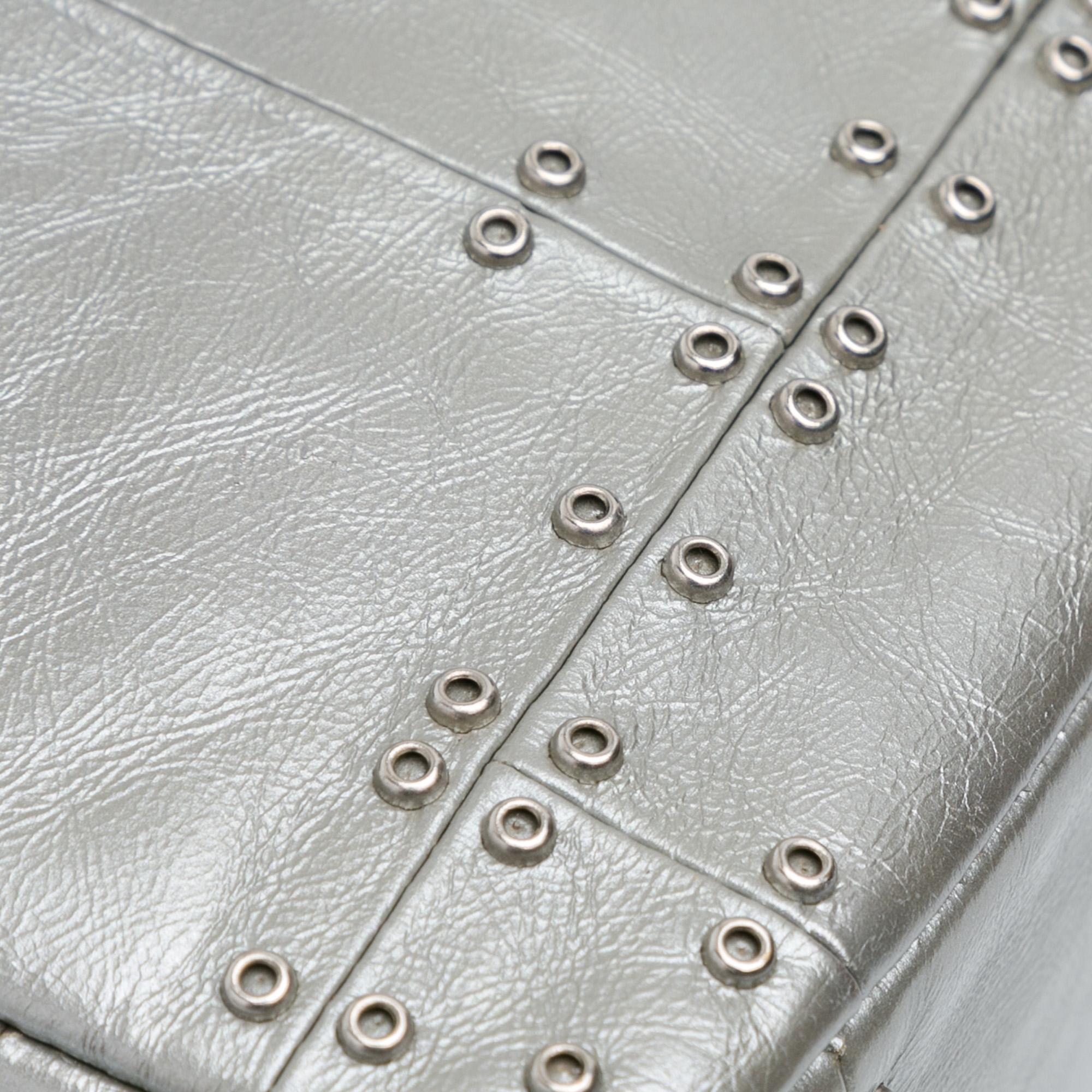 medium-glazed-calfskin-grommet-embellished-airline-double-flap