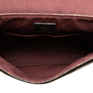 Monogram Macassar District PM